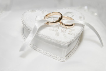 wedding rings in white box