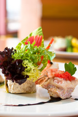 Shrimp appetizer wrapped in scallops