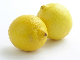 two yellow sour lemons