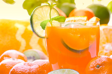 Fresh citrus drink (margarita, tequila sunrise etc) or juice - obrazy, fototapety, plakaty