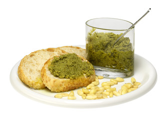 sliced bread with pesto sauce and pine-tree seed 