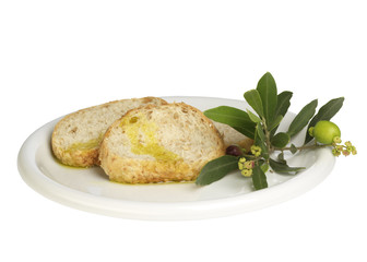 sliced bread with olive oil (isolated on white)