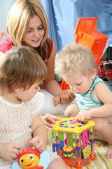 mother and children in playroom