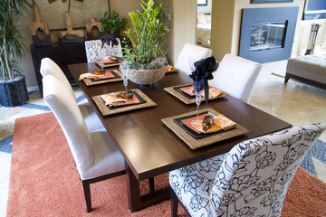 Dining room and table with luxurious decor.