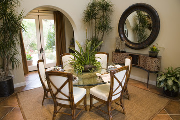 Dining room and table with luxurious decor.