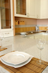 details of plate and glass in modern kitchen