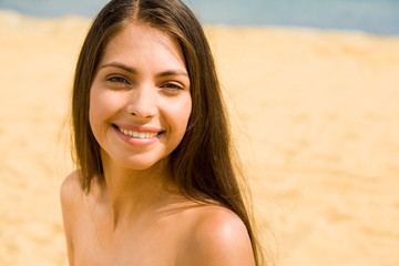 Image of perfect woman isolated on the background of sand