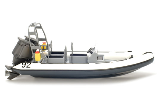 object on white - toy model motor boat