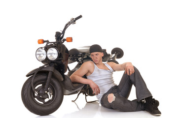 Fototapeta na wymiar Handsome young male motorcycle mechanic,