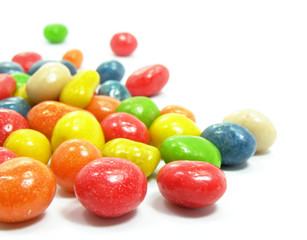 group of coloured sweet candies isolated over white