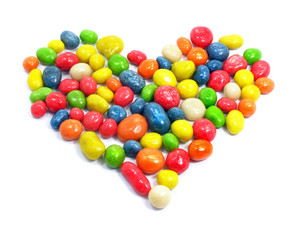 shape of heart made from the coloured sweet candies