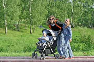 Mother with children on walk