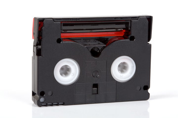 Mini Dv casette close up on isolated white background.