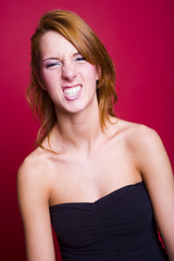 Fototapeta premium beautifull girl pulling funny face