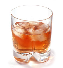 A glass of whisky on white background