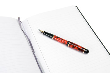 Lines note pad with fountain pen and ribbon place markers