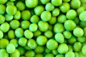 Green peas close-up may be used as background
