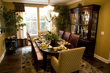 Dining room and table with luxurious decor.