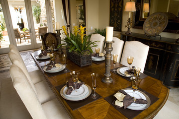 Dining room and table with luxurious decor.