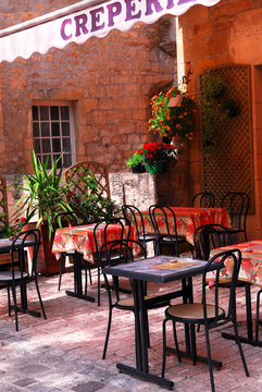 Restaurant patio in medieval town of Sarlat, France