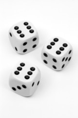 Three dices on white background