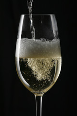 champagne splash on flute glass