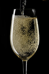 champagne splash on flute glass