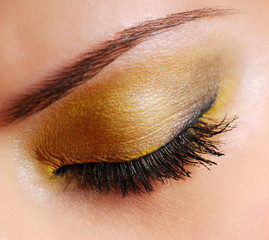 Fashion make-up — Bright yellow eyeshadow on eyes closed - obrazy, fototapety, plakaty