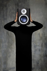 man with audio speaker head