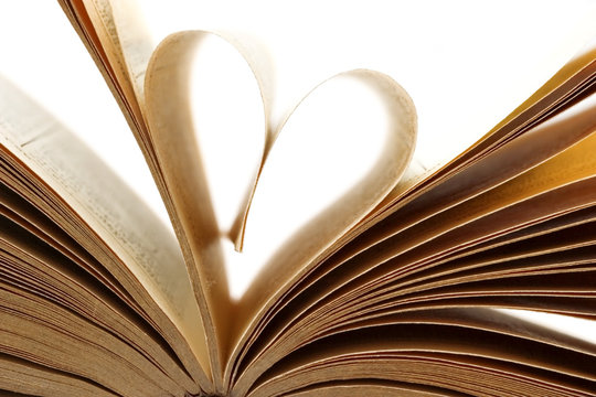 Pages of a book folded in to a heart shape