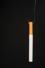 The concept of being hooked on tobacco products.