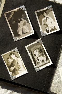 Photo Album with old stained photos