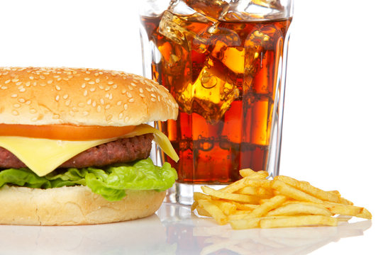 Cheeseburger, soda drink, on white background. Shallow DOF