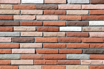 Background image of multi-colored stone wall.