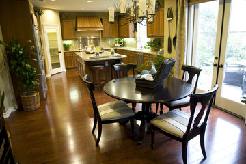 Kitchen with breakfast table and modern decor. 