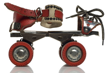 Naklejka premium a vintage roller skate on white background