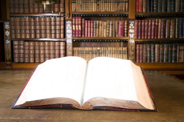 Open book in old library