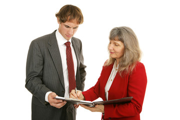 Mature female mentor and young male employee 