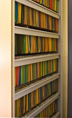 Doctor’s metallic cabinet with hundreds of colorful files