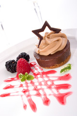 delicious chocolate cheesecake with fresh raspberries
