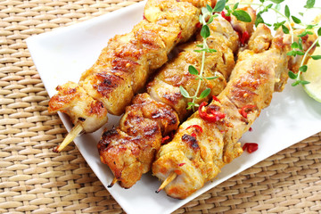 Chicken skewers, with chili, lime and herbs