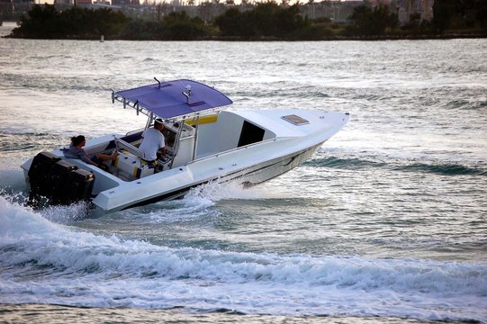 Motor Boat With Blue Canopy