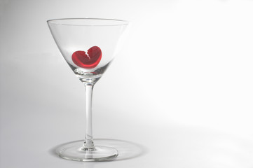 A broken heart drowning in a martini glass.