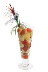 Fruit sundae in tall glass isolated on white background