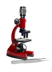 red microscope and tweezers isolated on white background