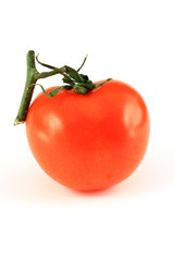three tomatos with a bit of shadow isolated on white