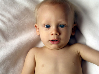 Portrait of a baby boy on white background