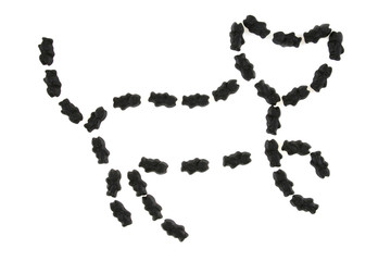 Cat shape made of small liquorice snacks