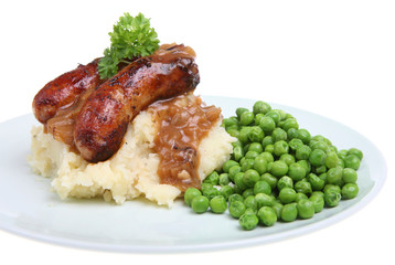 Pork sausages with mashed potato, peas and onion gravy