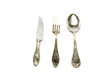 Spoon, knife and fork isolated on white background